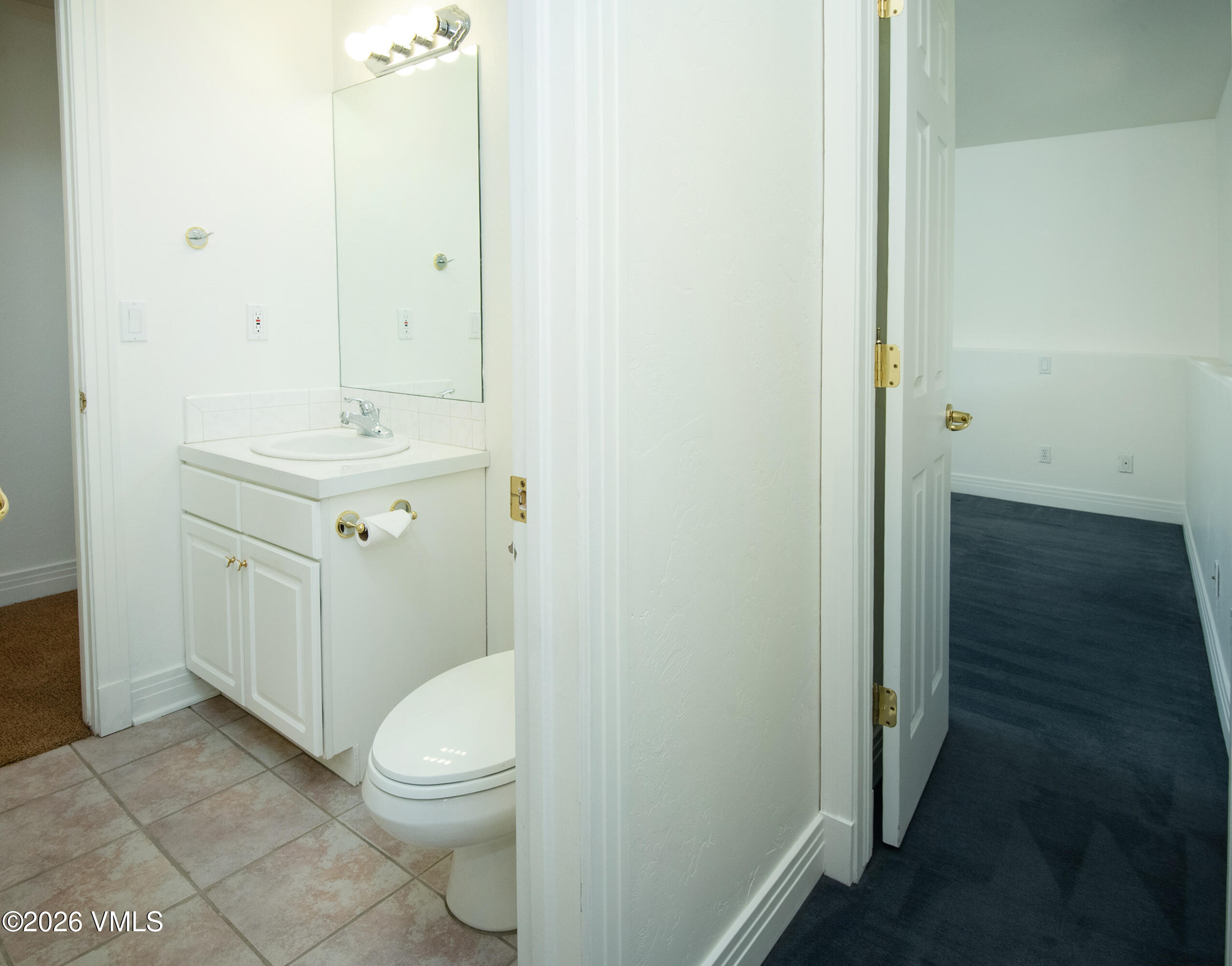 471 Rawhide Road Edwards, CO 81632 - Photo 40 of 51 a bathroom with a sink a toilet and shower