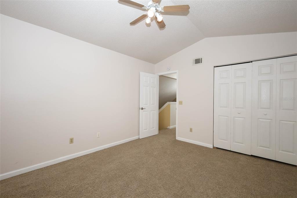 5405 Rutland Court Orlando, FL 32812 - Photo 20 of 33 a view of a livingroom with a ceiling fan and window