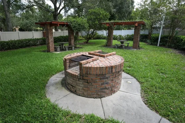 a view of a house with backyard