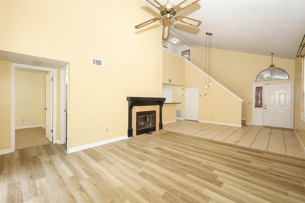 5405 Rutland Court Orlando, FL 32812 - Photo 8 of 33 a view of an empty room and chandelier fan