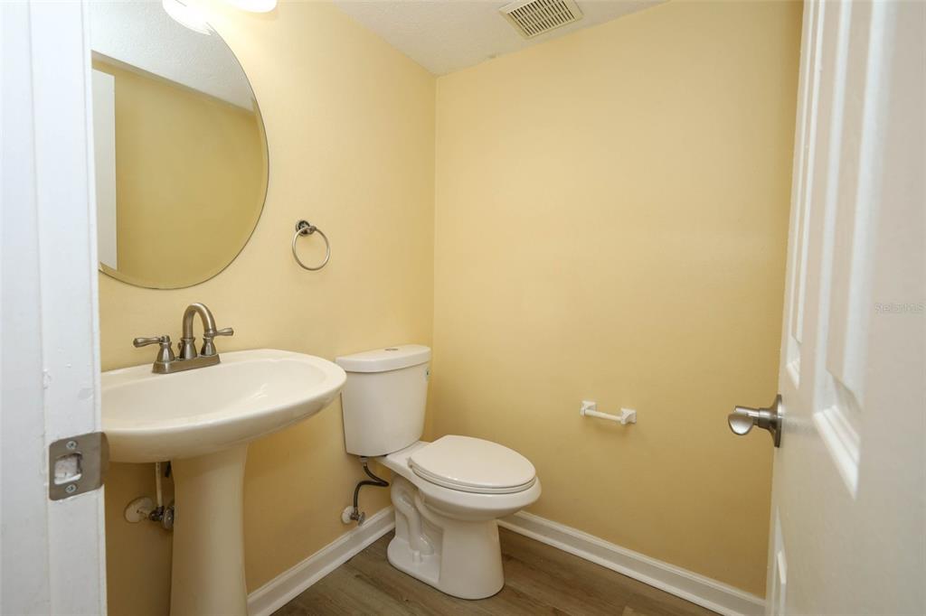 5405 Rutland Court Orlando, FL 32812 - Photo 9 of 33 a bathroom with a sink and a toilet