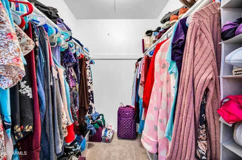 a bed room with a bed and a couch