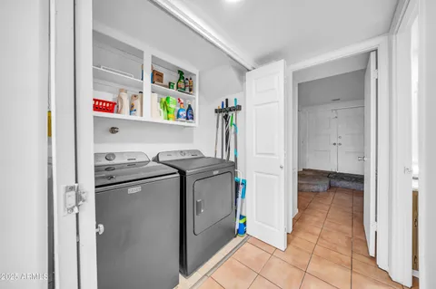 a kitchen with counter top space and cabinets
