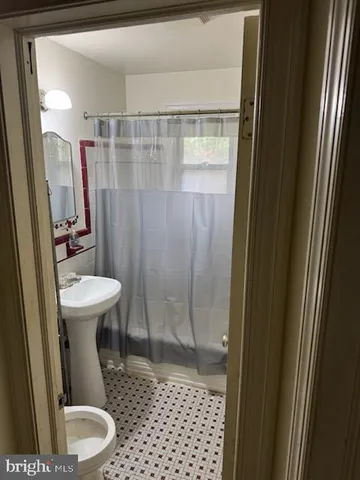 a bathroom with a sink and a toilet