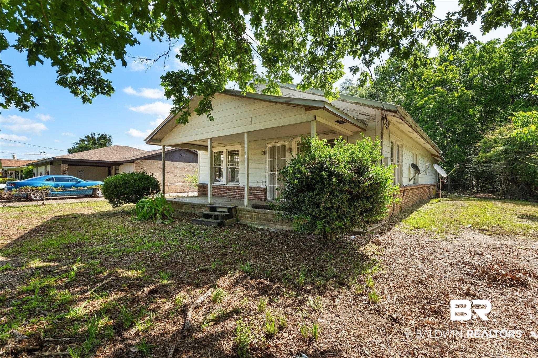 672 Burden Street Mobile, AL 36607 - Photo 20 of 20 Bungalow-style home with covered porch and brick siding