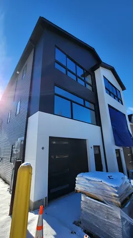 a front view of a house with stairs