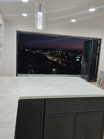 a bathroom with a sink a vanity and a mirror