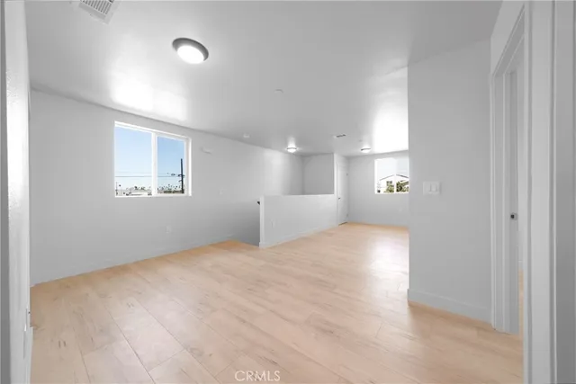 a kitchen with a refrigerator a sink and dishwasher