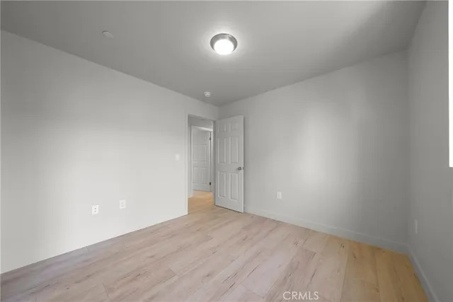 an aerial view of residential house with outdoor space and parking