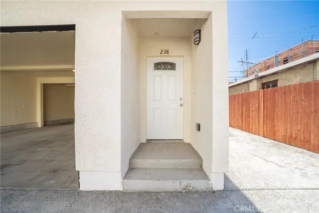 a view of a backyard of the house