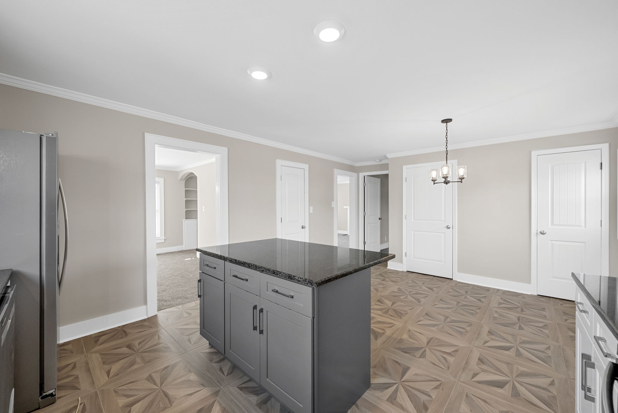 2021 Powell Road Clarksville, TN 37043 - Photo 11 of 31 a kitchen with a sink refrigerator and cabinets