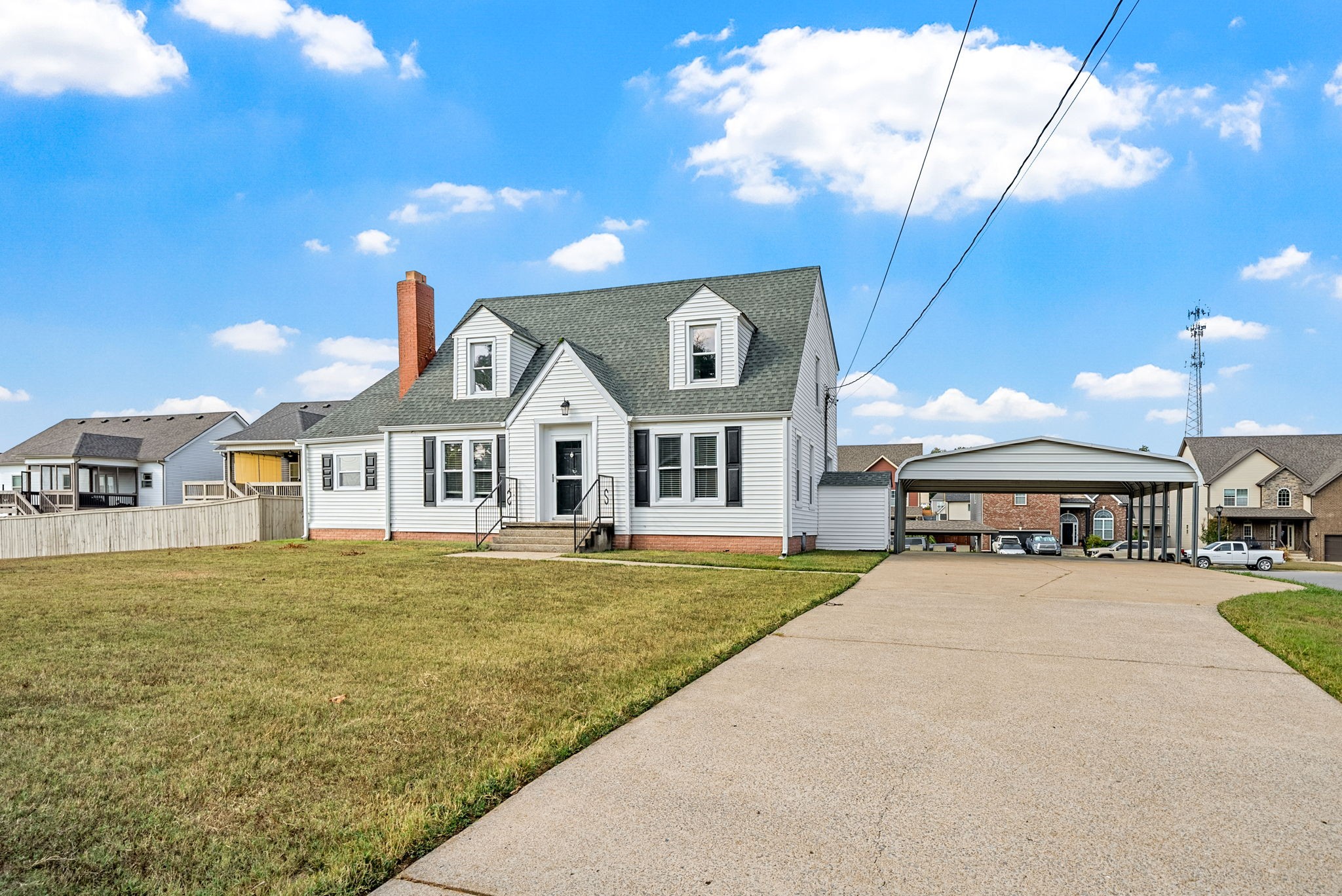 2021 Powell Road Clarksville, TN 37043 - Photo 2 of 31 a front view of a house with garden and porch