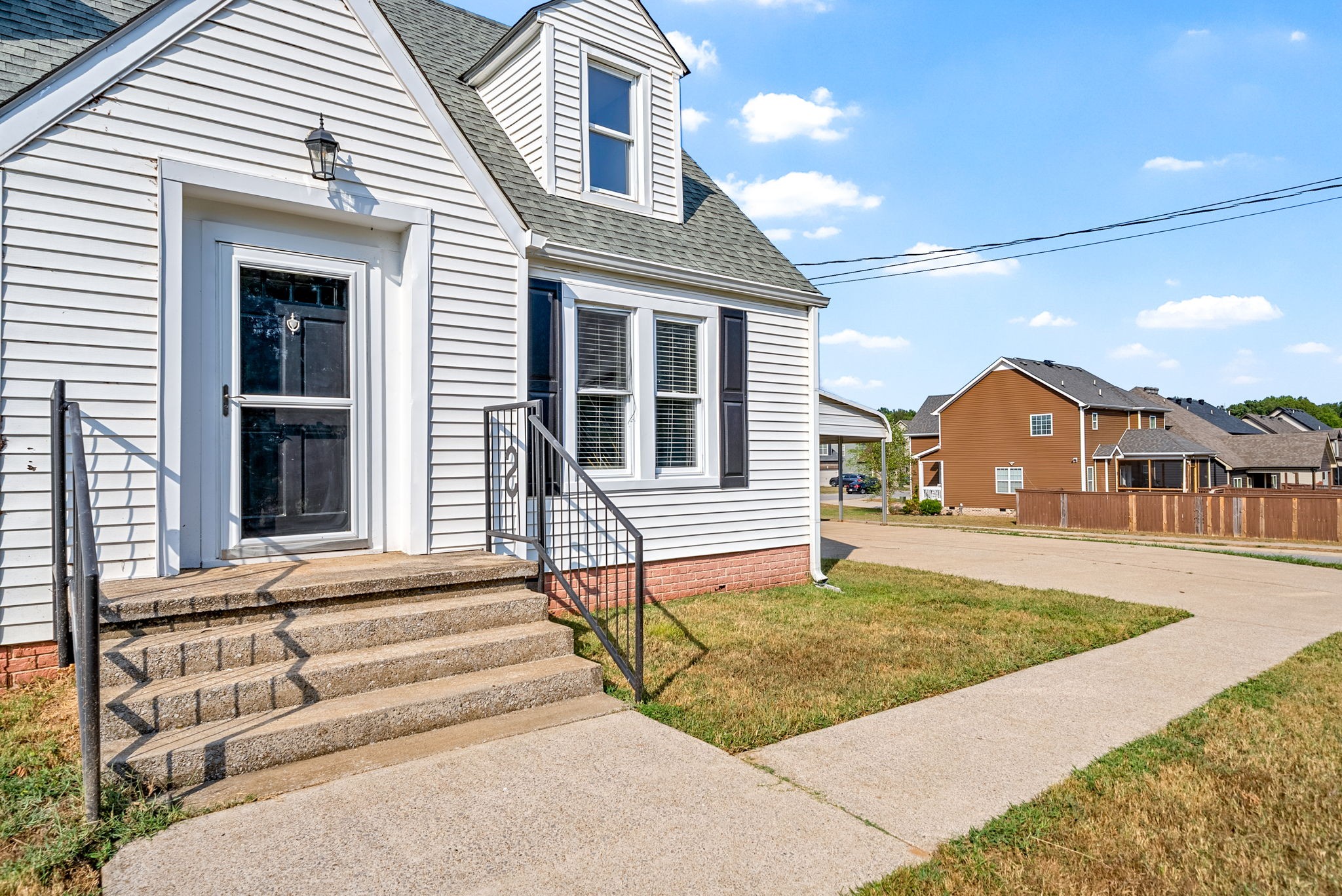 2021 Powell Road Clarksville, TN 37043 - Photo 3 of 31 a front view of a house with a yard
