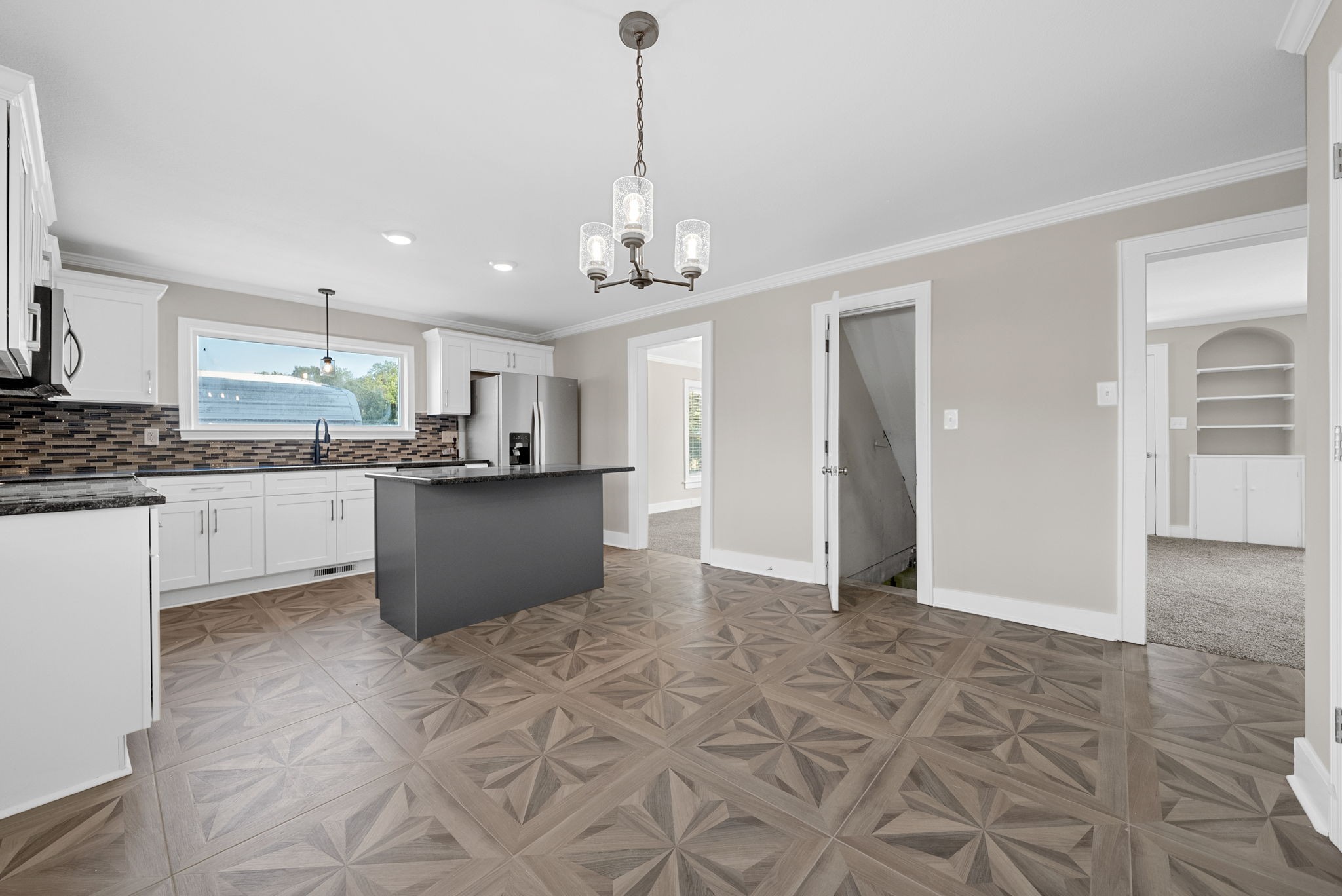 2021 Powell Road Clarksville, TN 37043 - Photo 7 of 31 a kitchen with stainless steel appliances granite countertop a refrigerator and a sink