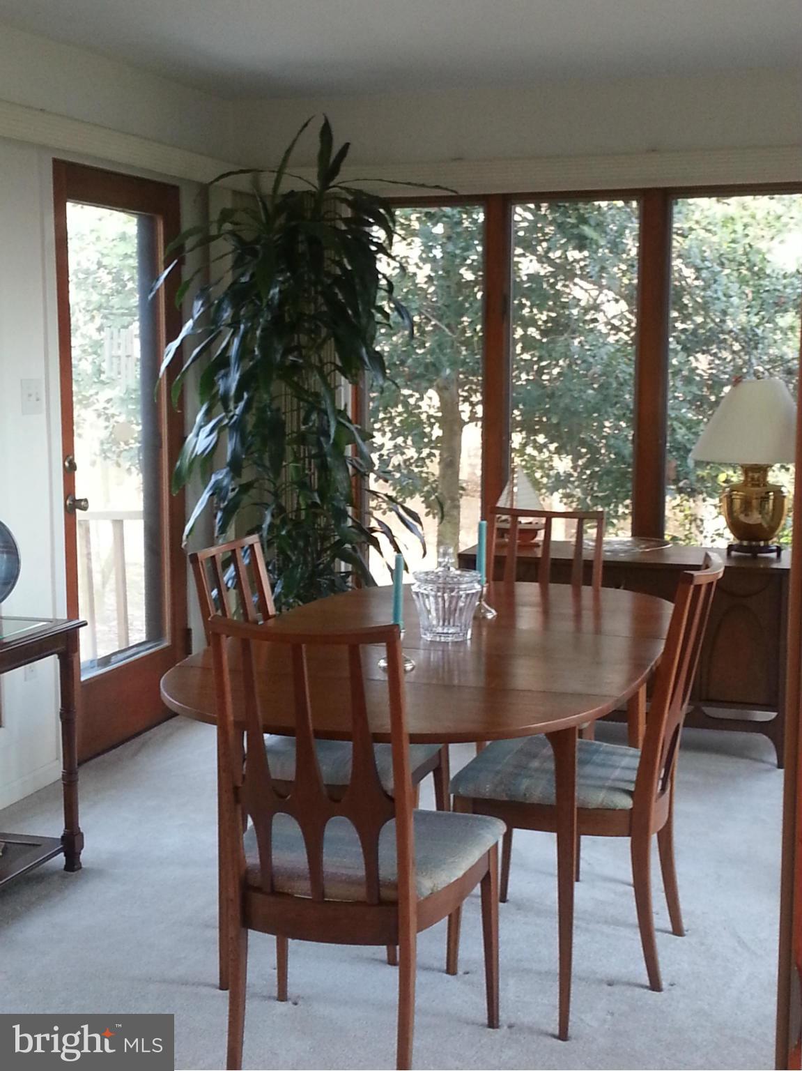 2715 Emmanuel Church Road Huntingtown, MD 20639 - Photo 21 of 28 a view of a dining room with furniture window and outside view