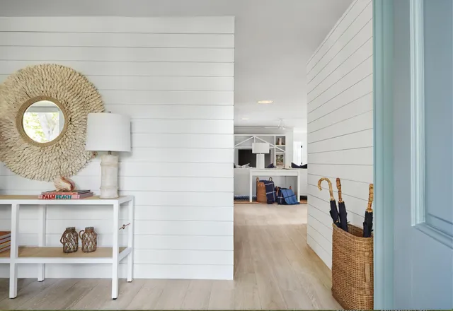 a view of living room with furniture and rug