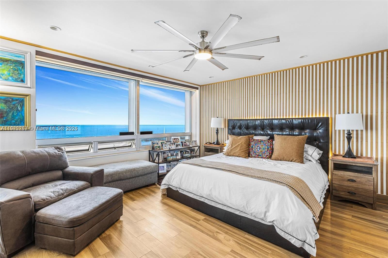 1541 Brickell Avenue, Unit A3902 Miami, FL 33129 - Photo 15 of 24 a bedroom with furniture and a large window