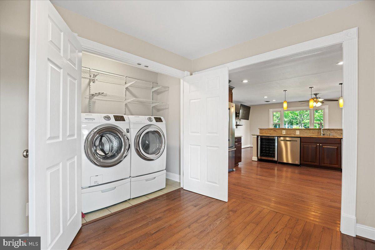 743 Masons Beach Road Deale, MD 20751 - Photo 17 of 39 Laundry center with front loading W/D.