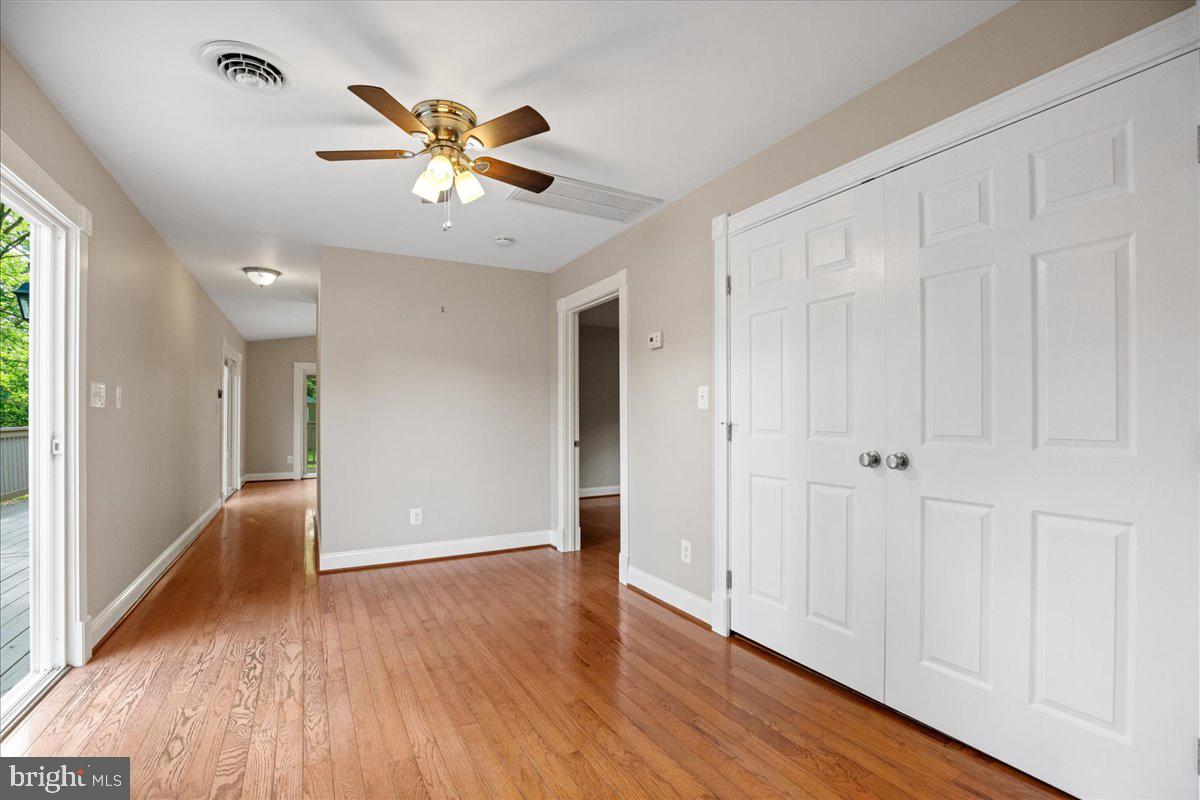 743 Masons Beach Road Deale, MD 20751 - Photo 18 of 39 Looking to thru to living room. Primary BD on R.