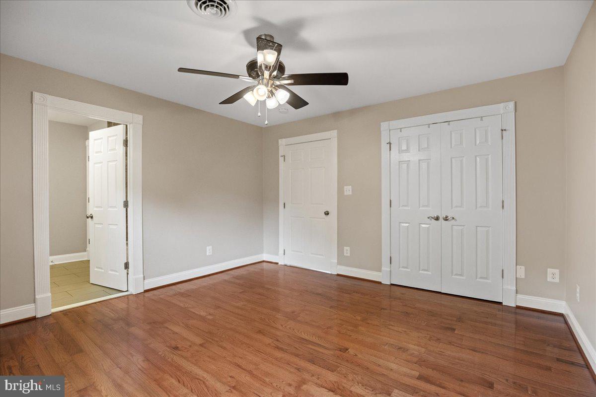 743 Masons Beach Road Deale, MD 20751 - Photo 19 of 39 Primary suite with walk in closet.
