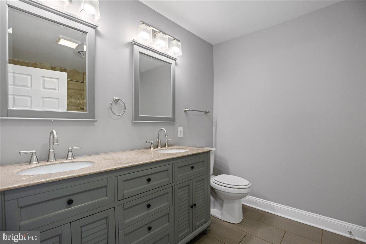 743 Masons Beach Road Deale, MD 20751 - Photo 21 of 39 Primary bath with dual vanity.
