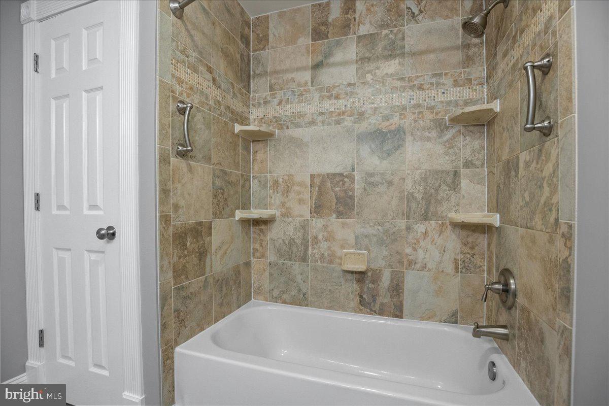 743 Masons Beach Road Deale, MD 20751 - Photo 22 of 39 Title surround shower with soaking tub.