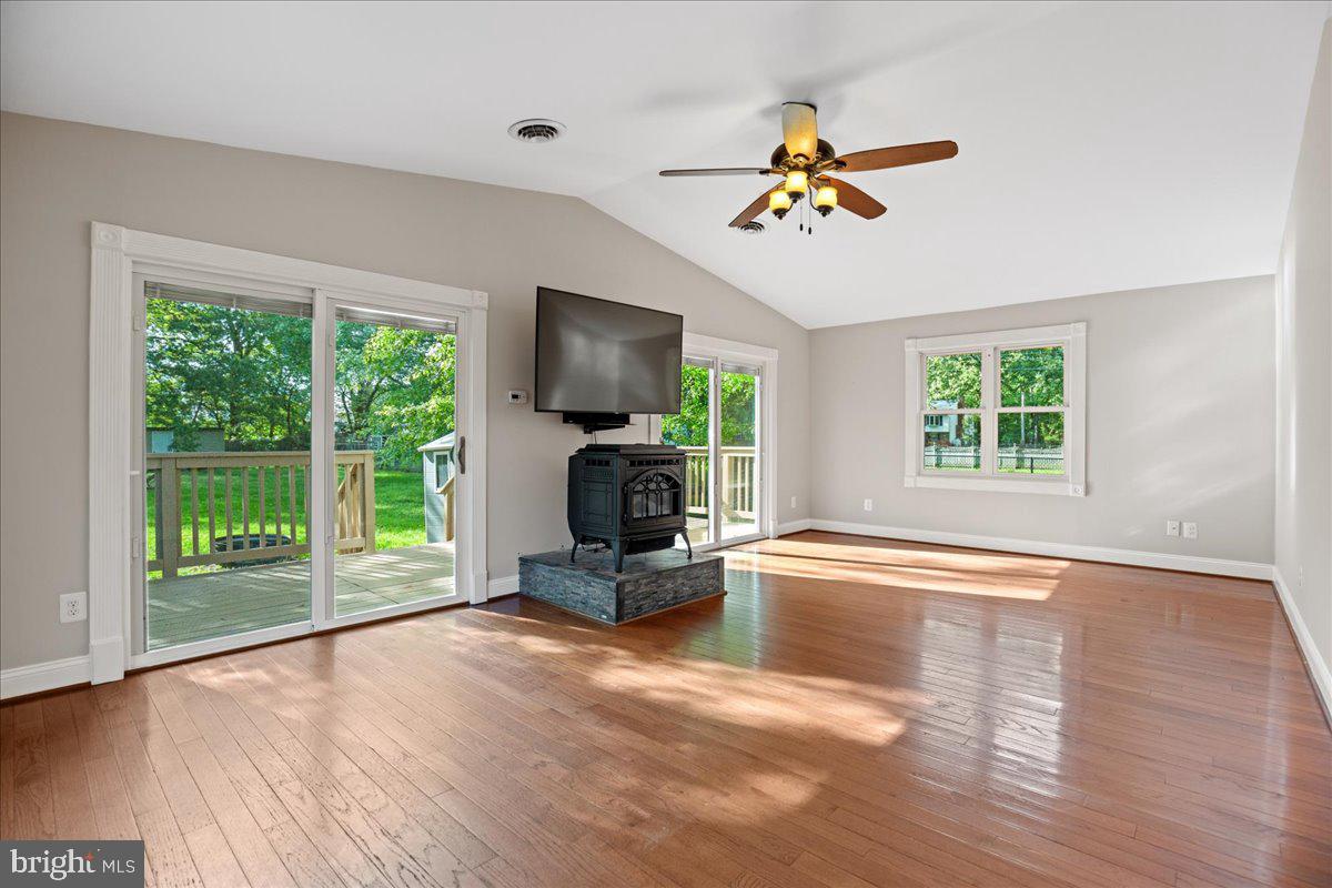 743 Masons Beach Road Deale, MD 20751 - Photo 23 of 39 Huge living room with vaulted ceilings.