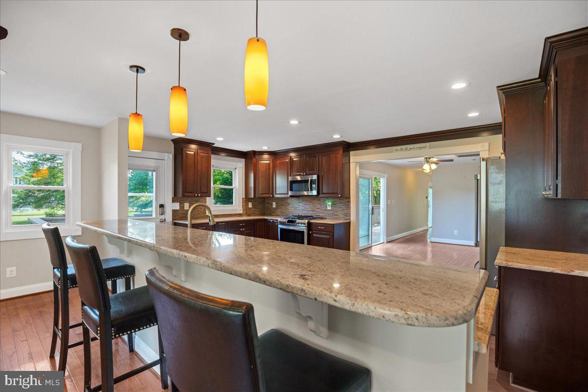 743 Masons Beach Road Deale, MD 20751 - Photo 3 of 39 Deluxe kitchen-great room area.