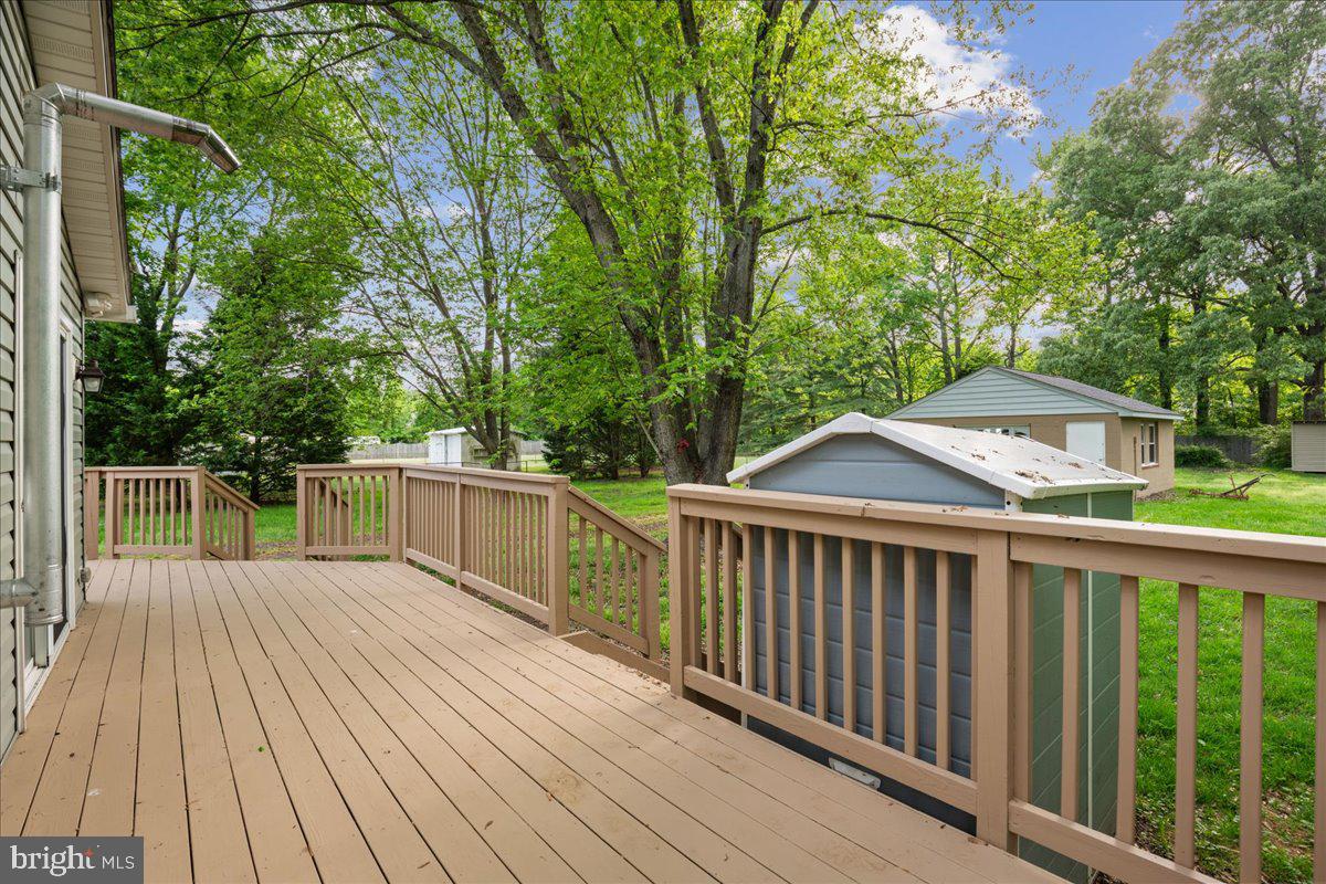 743 Masons Beach Road Deale, MD 20751 - Photo 32 of 39 Wraparound decking with multiple access points.