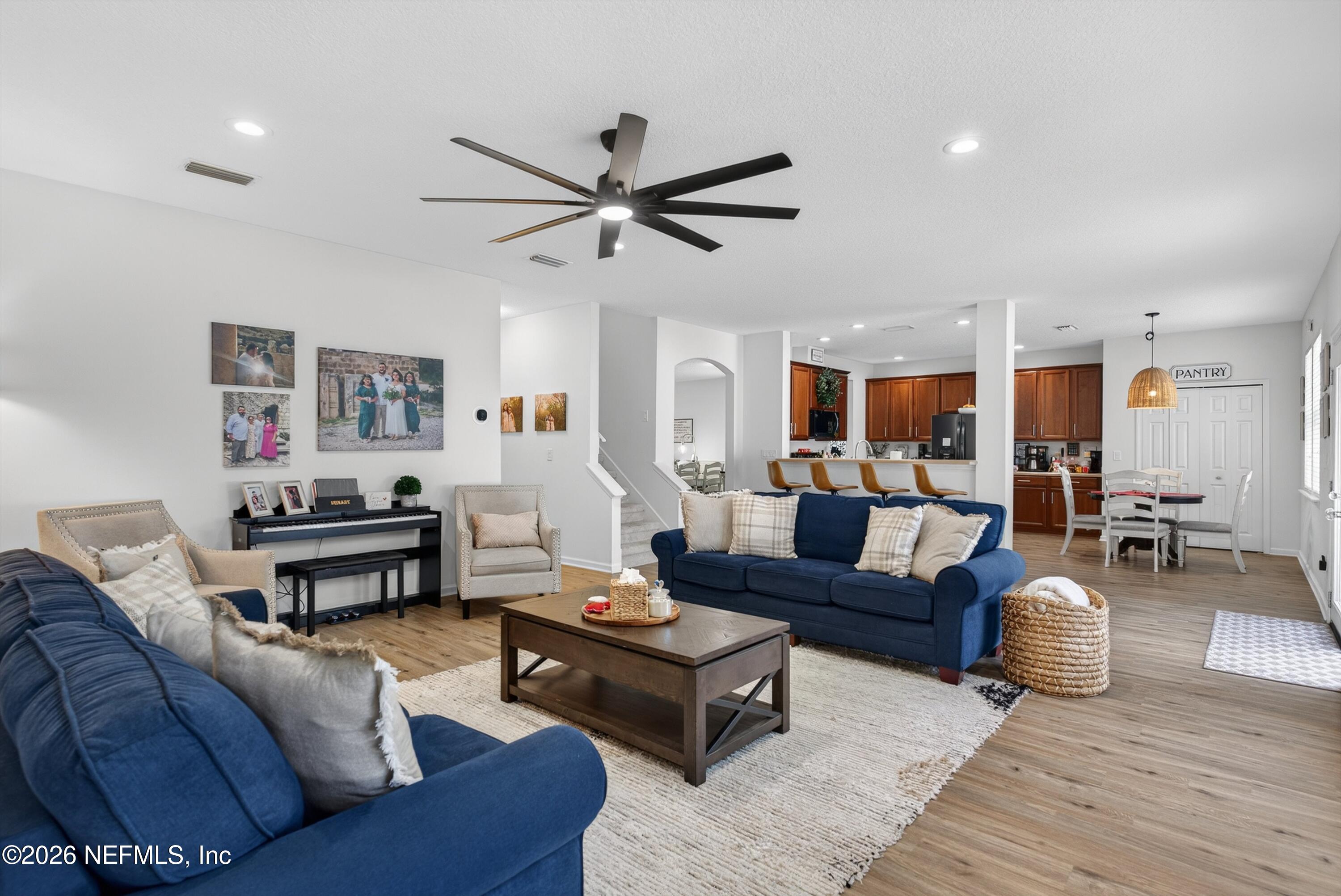 1214 South Kyle Way St. Johns, FL 32259 - Photo 32 of 78 a living room with furniture and a wooden floor