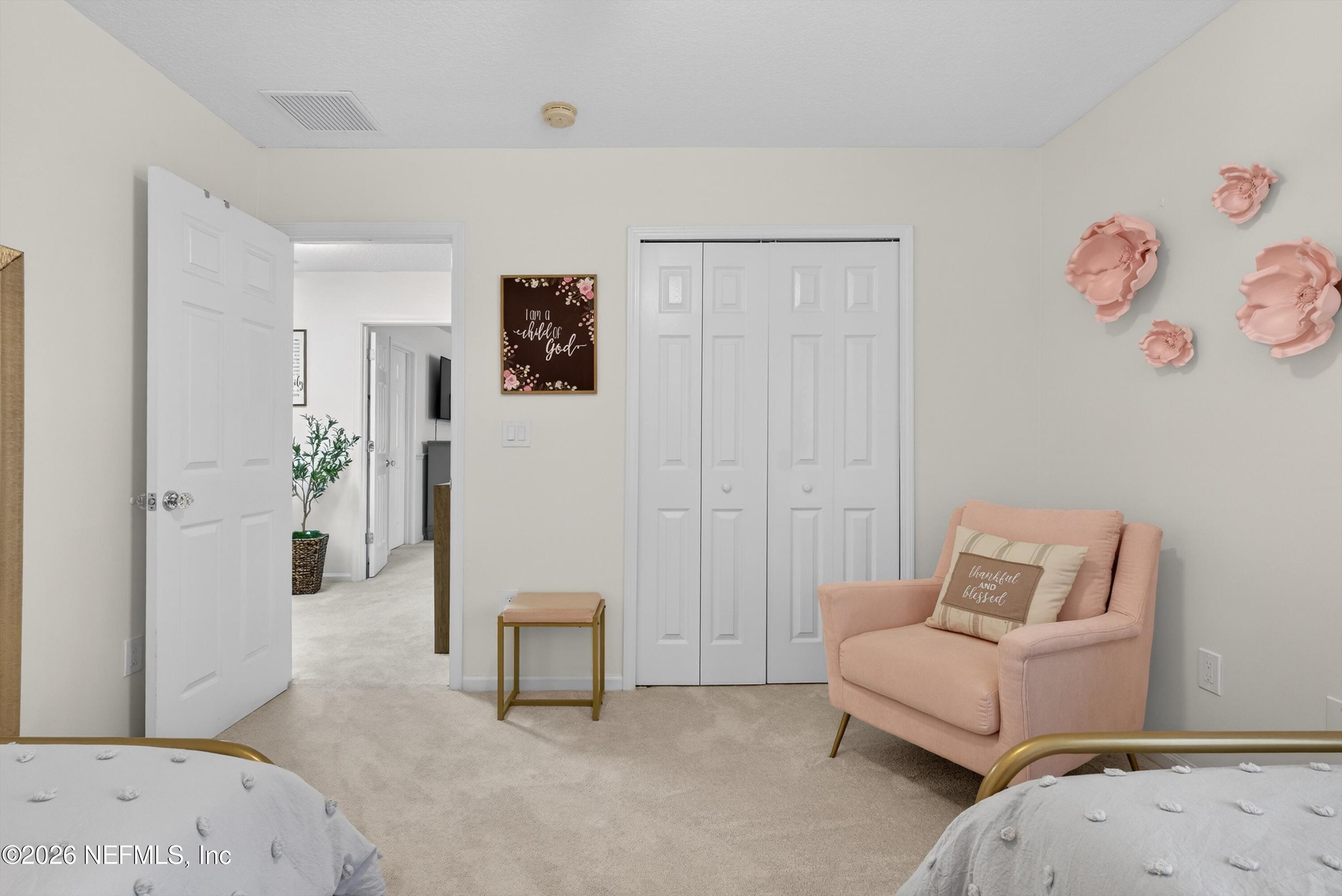 1214 South Kyle Way St. Johns, FL 32259 - Photo 46 of 78 a bedroom with a bed and a couch