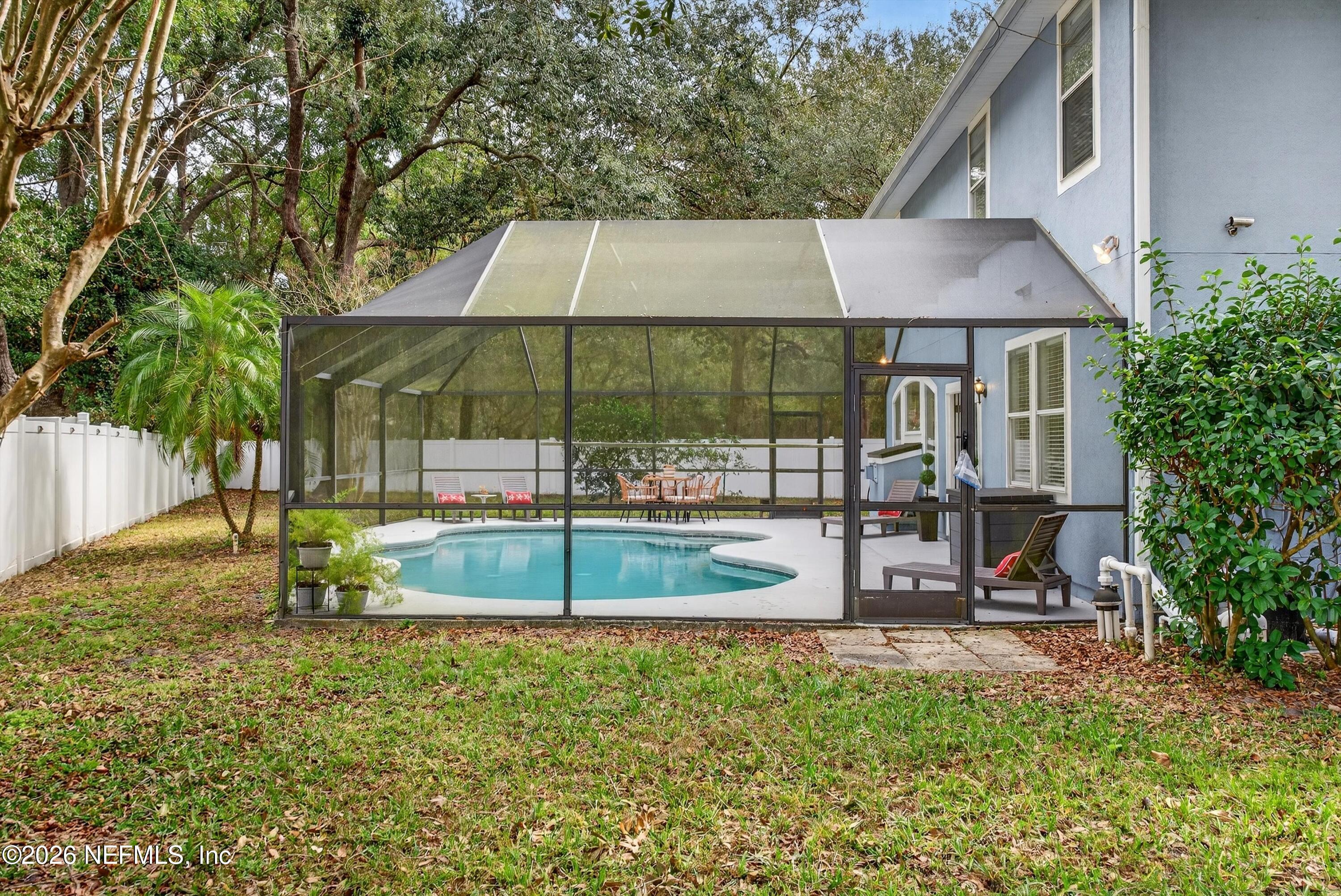 1214 South Kyle Way St. Johns, FL 32259 - Photo 60 of 78 a view of a house with backyard and sitting area