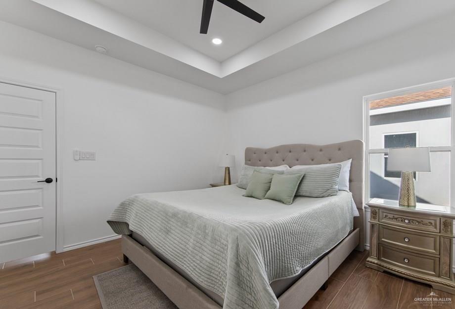 18002 Spruce Street Harlingen, TX 78552 - Photo 14 of 29 a bedroom with a bed and walk in closet