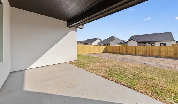 a view of large house with a yard
