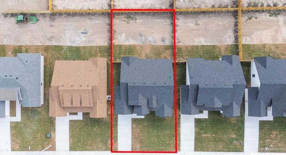 18002 Spruce Street Harlingen, TX 78552 - Photo 5 of 29 view of a house with a yard and sitting area