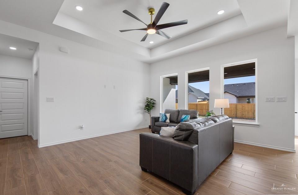 18002 Spruce Street Harlingen, TX 78552 - Photo 7 of 29 a living room with furniture and a large window