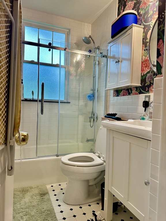 49 Grove Street, Unit 4 Newton, MA 02466 - Photo 18 of 19 a bathroom with a toilet and a shower