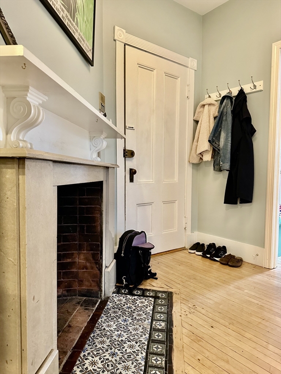 49 Grove Street, Unit 4 Newton, MA 02466 - Photo 6 of 19 a bedroom with a bed and a walk in closet