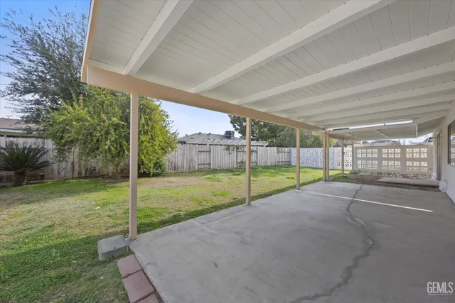 a view of a backyard with a garden