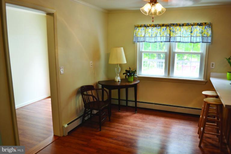 3355 Uniontown Road Westminster, MD 21158 - Photo 18 of 21 a room that has a dresser and a chair in it