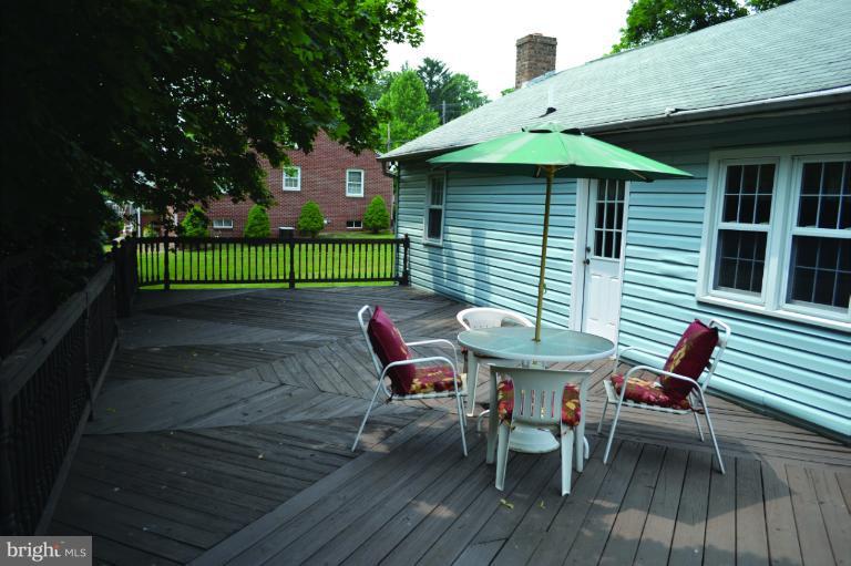 3355 Uniontown Road Westminster, MD 21158 - Photo 20 of 21 a view of a table and chairs in patio of the house