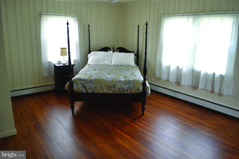 3355 Uniontown Road Westminster, MD 21158 - Photo 3 of 21 a room with wooden floor and window