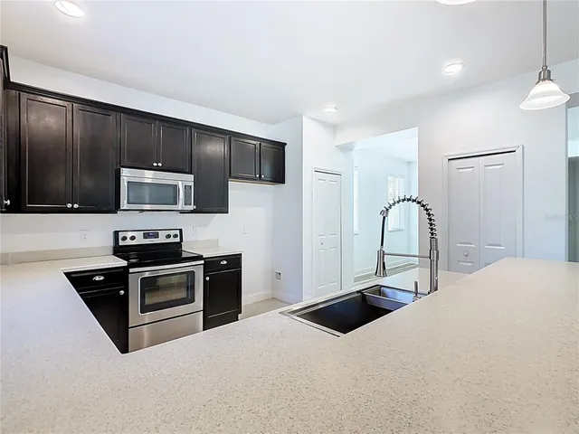 a bathroom with a sink toilet and mirror