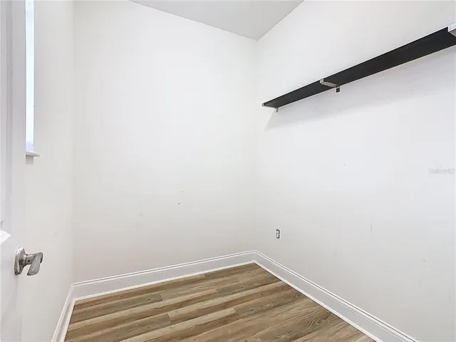 a view of a swimming pool from a balcony