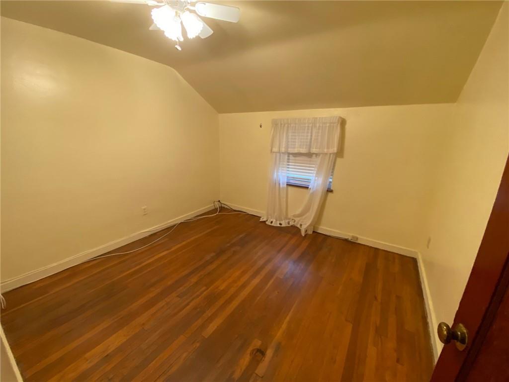 801 Beulah Road Pittsburgh, PA 15235 - Photo 15 of 23 a view of empty room with wooden floor