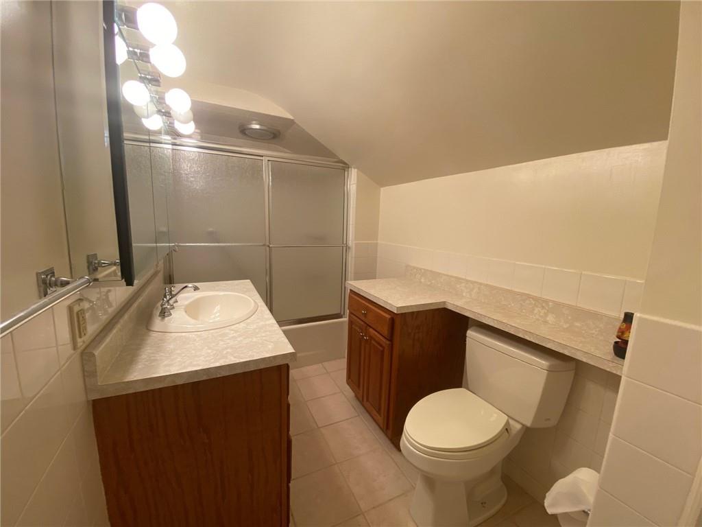 801 Beulah Road Pittsburgh, PA 15235 - Photo 17 of 23 a bathroom with a granite countertop toilet and a sink