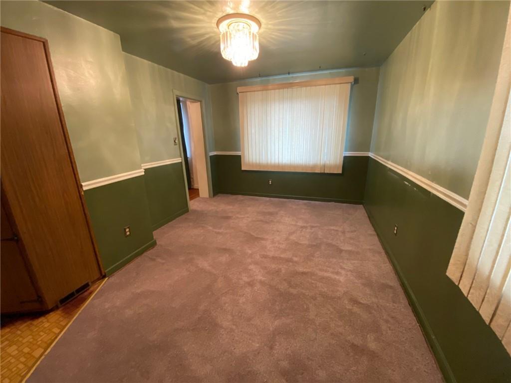 801 Beulah Road Pittsburgh, PA 15235 - Photo 7 of 23 a view of an empty room with a window