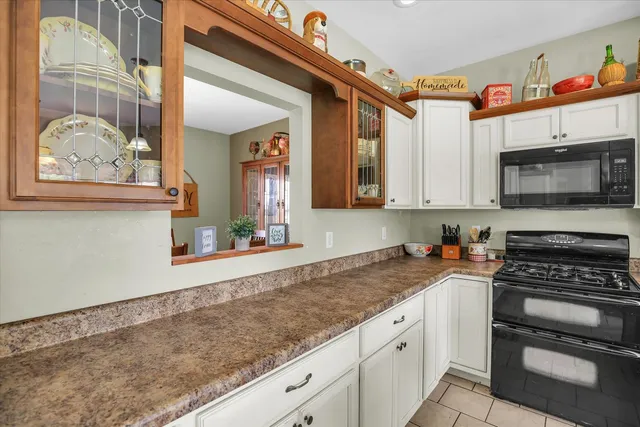a utility room with a sink dryer and washer