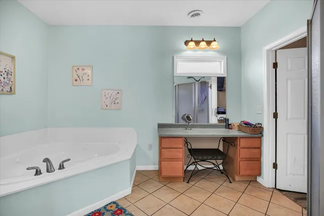 a work room with furniture and wooden floor