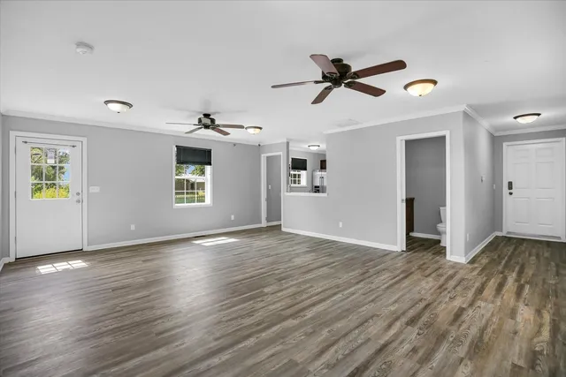 a kitchen with granite countertop stainless steel appliances and sink